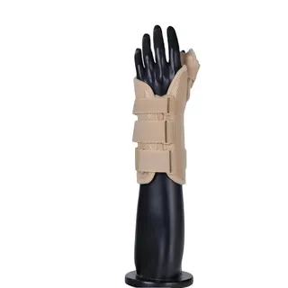Muñequera con paralizador de pulgar